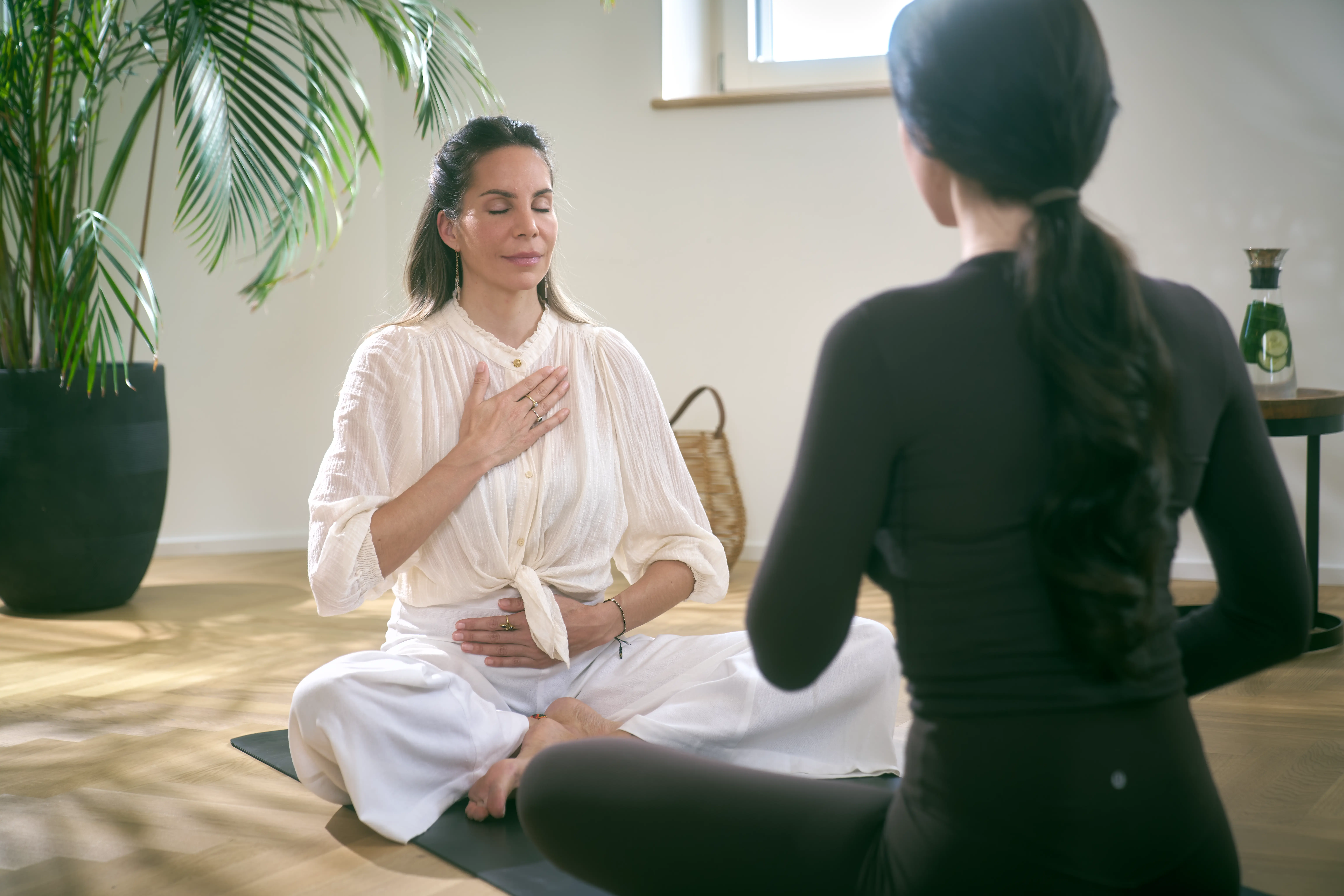 Woman practicing breathwork therapy at Paracelsus Recovery