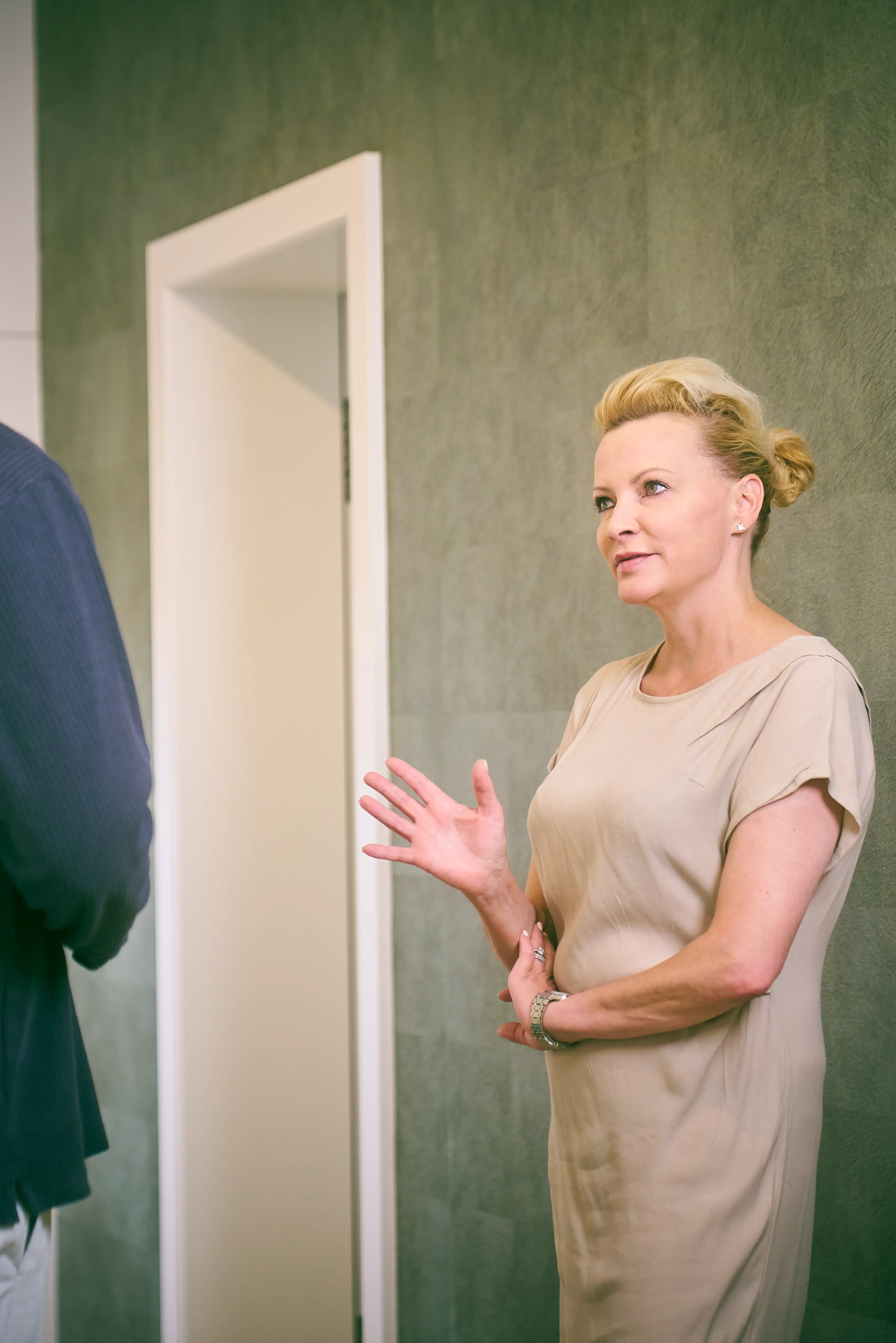 Person walking through a sunlit garden at Paracelsus Recovery